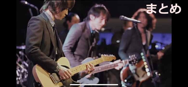 桜井和寿とギターのセッションをしている田原の写真